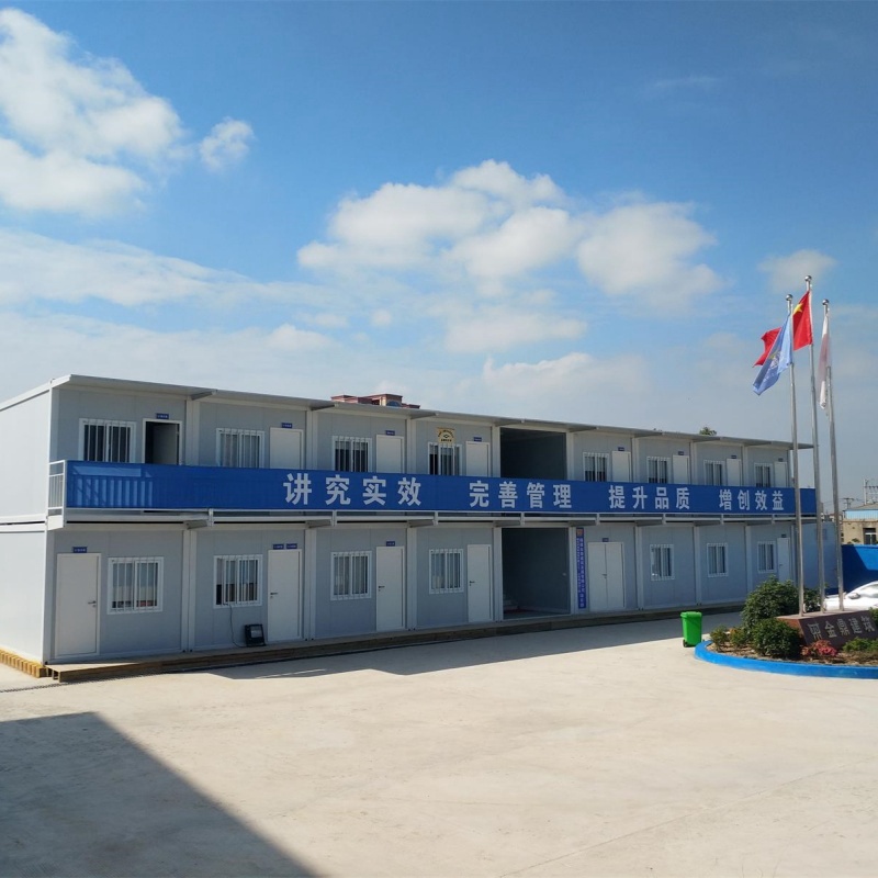 Double-decker flat packed container houses serve as dormitories for site office workers